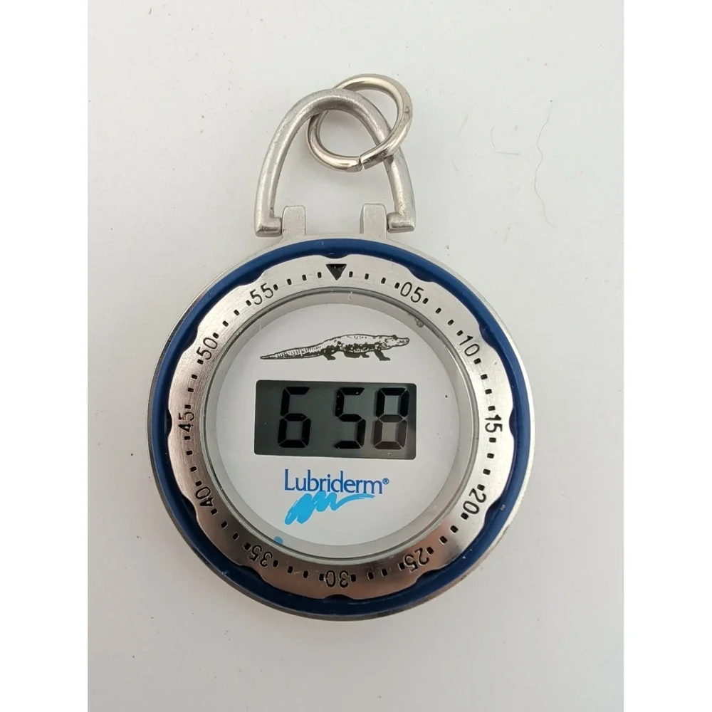 Lubriderm Digital Promotional Watch White Dial Silver 44mm Case- New Battery